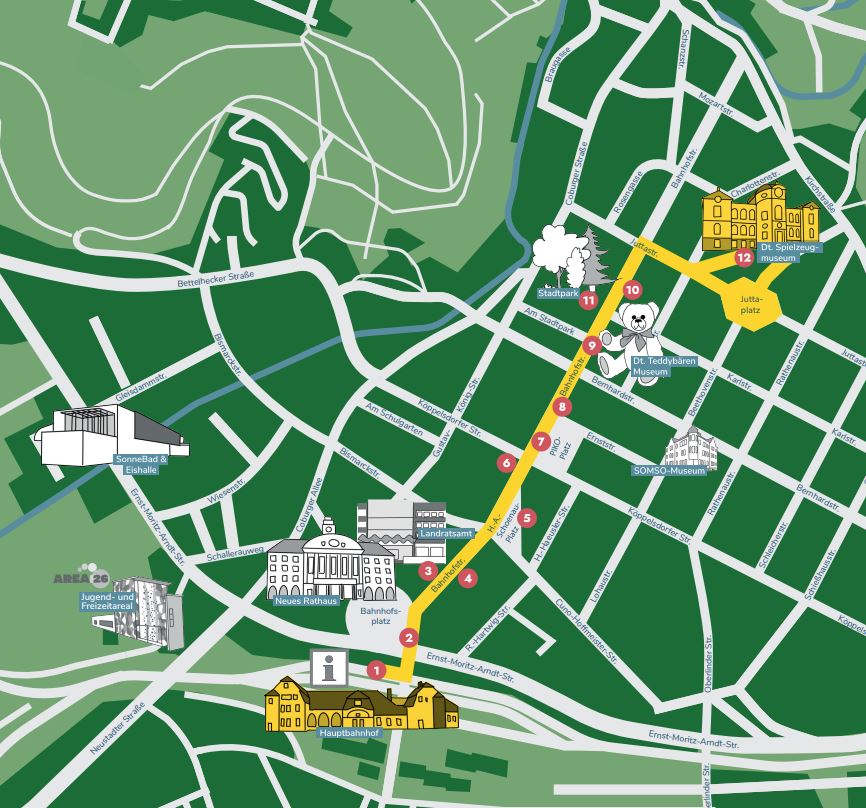 Grün gehaltener Stadtplan mit zahlreichen Straßen von Sonneberg, auf dem die Spielmeile in gelb aufgenommen wurde. Daneben zahlreiche wichtige Gebäude.