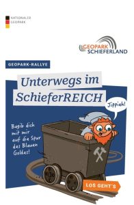Ein kleiner Knappe mit Bergwerkswerkzeug auf blauem Hintergrund.